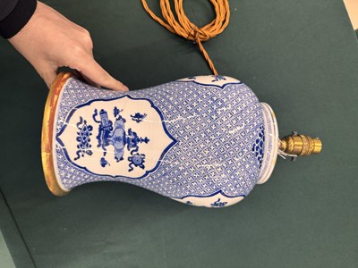 Lot 5 - A Chinese blue and white 'precious objects' vase, Qing dynasty, Kangxi period