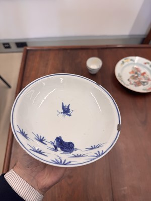 Lot 44 - A Chinese blue and white 'frog and butterfly' dish, Ming dynasty, Tianqi period