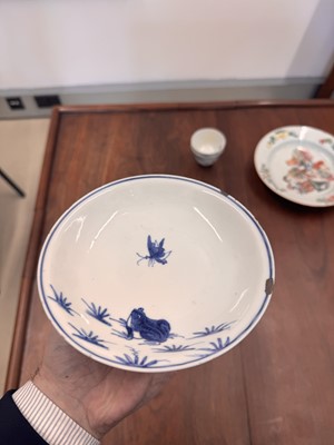 Lot 44 - A Chinese blue and white 'frog and butterfly' dish, Ming dynasty, Tianqi period
