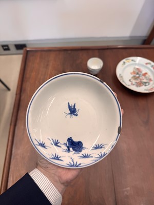 Lot 44 - A Chinese blue and white 'frog and butterfly' dish, Ming dynasty, Tianqi period