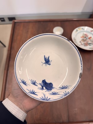 Lot 44 - A Chinese blue and white 'frog and butterfly' dish, Ming dynasty, Tianqi period
