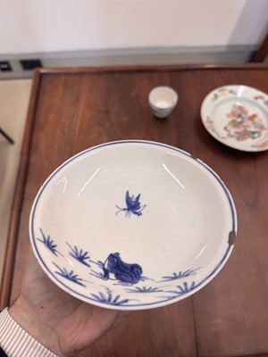 Lot 44 - A Chinese blue and white 'frog and butterfly' dish, Ming dynasty, Tianqi period