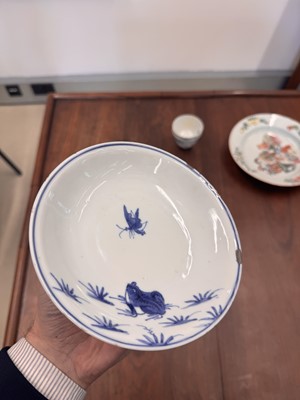 Lot 44 - A Chinese blue and white 'frog and butterfly' dish, Ming dynasty, Tianqi period