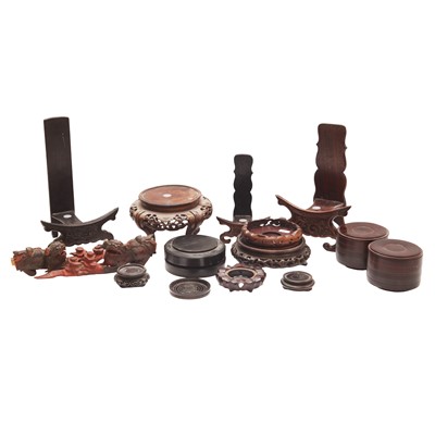 Lot 583 - A group of Chinese carved wood stands, 19th/20th century