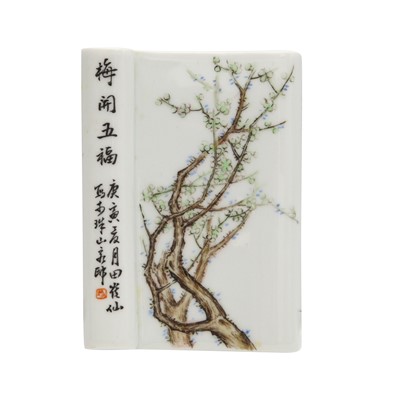 Lot 424 - A Chinese famille-rose 'prunus' wrist rest, Republic period