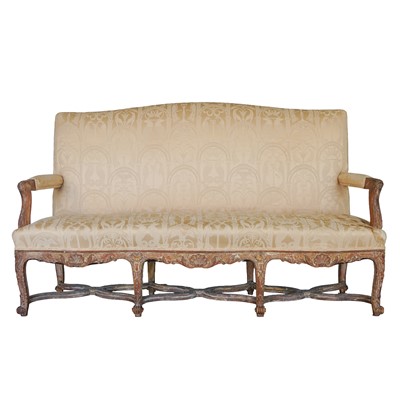 Lot 235 - A Louis XV style carved beech upholstered canapé, 20th century
