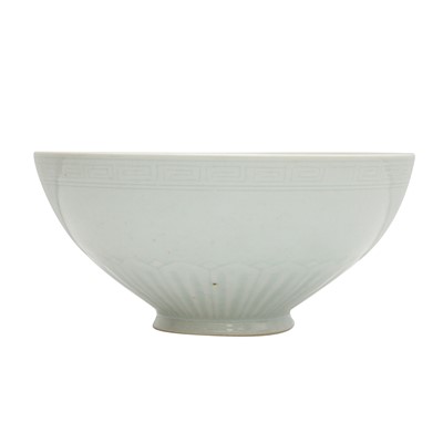 Lot 669 - A Chinese celadon glazed 'lotus' bowl, 19th/20th century