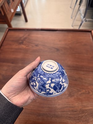 Lot 61 - A Chinese blue and white 'Eight Daoist Immortals' bowl, Qing dynasty, Tongzhi period