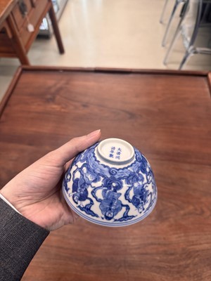 Lot 61 - A Chinese blue and white 'Eight Daoist Immortals' bowl, Qing dynasty, Tongzhi period