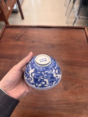 Lot 61 - A Chinese blue and white 'Eight Daoist Immortals' bowl, Qing dynasty, Tongzhi period