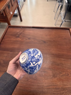 Lot 61 - A Chinese blue and white 'Eight Daoist Immortals' bowl, Qing dynasty, Tongzhi period