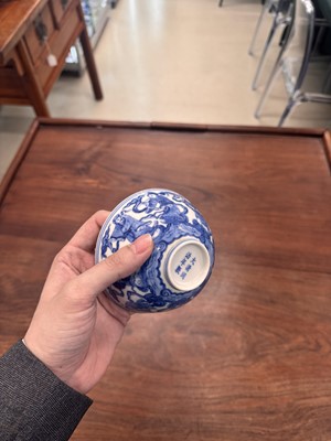 Lot 61 - A Chinese blue and white 'Eight Daoist Immortals' bowl, Qing dynasty, Tongzhi period