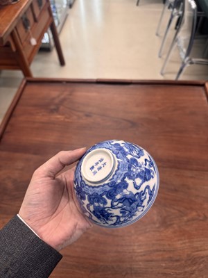 Lot 61 - A Chinese blue and white 'Eight Daoist Immortals' bowl, Qing dynasty, Tongzhi period