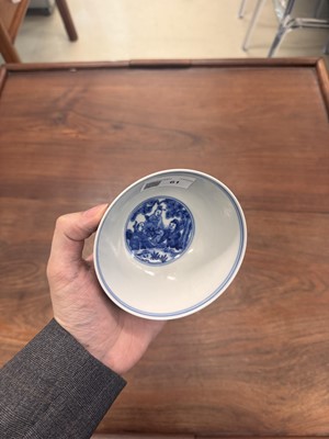 Lot 61 - A Chinese blue and white 'Eight Daoist Immortals' bowl, Qing dynasty, Tongzhi period