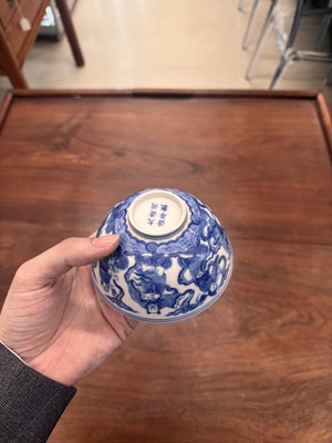 Lot 61 - A Chinese blue and white 'Eight Daoist Immortals' bowl, Qing dynasty, Tongzhi period