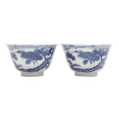 Lot 750 - Two Chinese blue and white 'crane' cups, 20th century