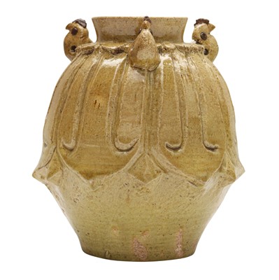 Lot 671 - A Chinese straw-glazed 'lotus' jar, Northern Qi dynasty