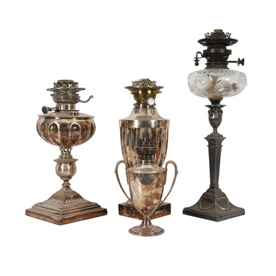 Lot 310 - A group of four Victorian silver plated oil lamps