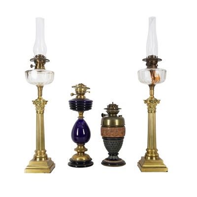 Lot 311 - A pair of brass Corinthian column oil lamps