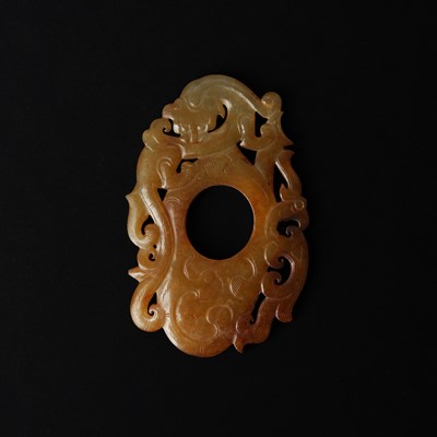 Lot 534 - A Chinese jade archaistic 'dragon and phoenix' pendant plaque, Qing dynasty