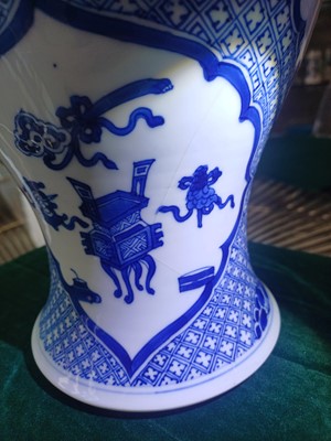 Lot 4 - A Chinese blue and white 'cranes' phoenix-tail vase, Qing dynasty, Kangxi period