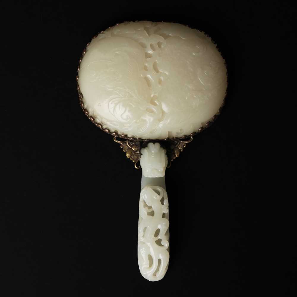 Lot 110 - A fine Chinese white jade plaque and belt hook, Qing dynasty, 18th century