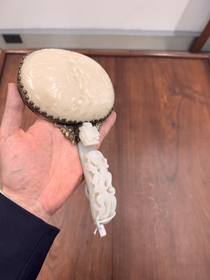 Lot 110 - A fine Chinese white jade plaque and belt hook, Qing dynasty, 18th century