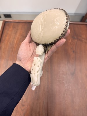 Lot 110 - A fine Chinese white jade plaque and belt hook, Qing dynasty, 18th century