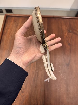 Lot 110 - A fine Chinese white jade plaque and belt hook, Qing dynasty, 18th century