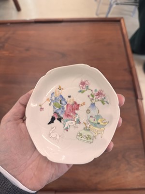 Lot 50 - A pair of fine Chinese famille-rose semi-eggshell 'boys' cups and saucers, Qing dynasty, Yongzheng period