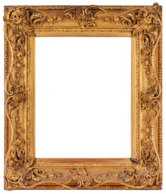Lot 235 - An English 19th Century, pierced and swept gilded composition frame