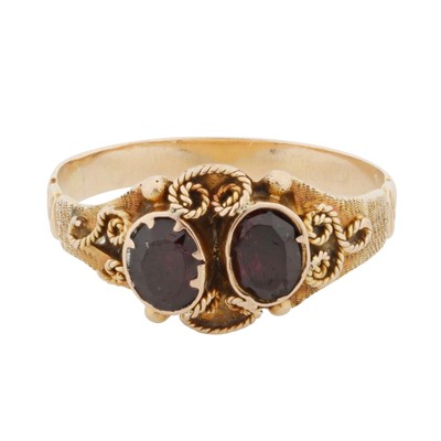 Lot 36 - A garnet two stone ring