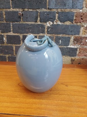 Lot 85 - A Chinese monochrome clair-de-lune 'chilong' jar, Qing dynasty, 19th century