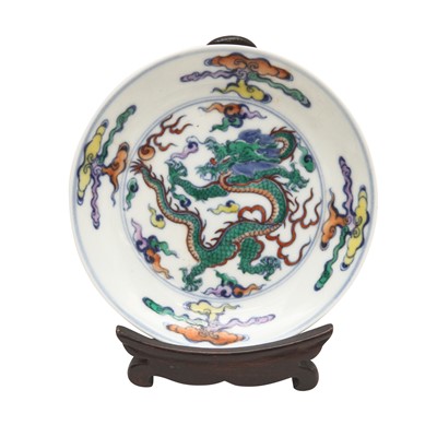 Lot 363 - A Chinese doucai 'dragon' saucer, Qing dynasty