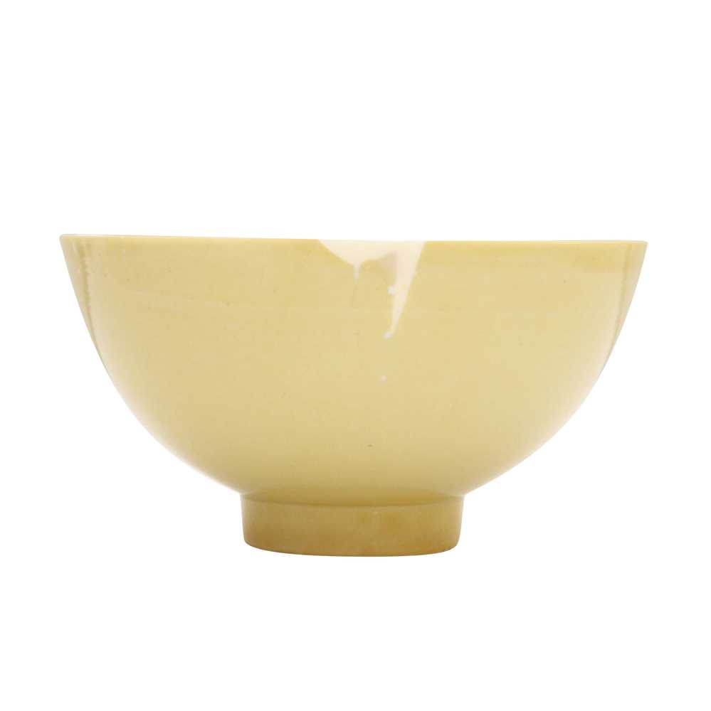 Lot 29 - A Chinese Imperial monochrome yellow-glazed bowl, Qing dynasty, Kangxi mark and of the period