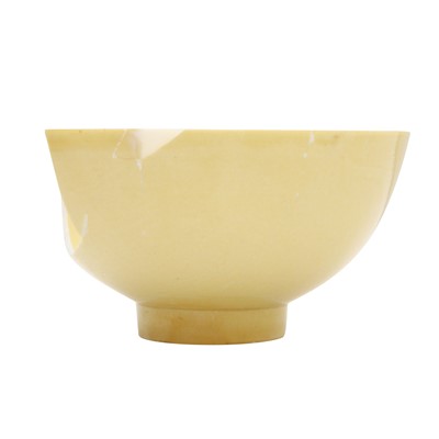 Lot 29 - A Chinese Imperial monochrome yellow-glazed bowl, Qing dynasty, Kangxi mark and of the period