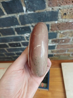 Lot 28 - A partial Chinese Imperial peachbloom-glazed brush washer, Qing dynasty, Kangxi mark and period