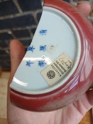 Lot 28 - A partial Chinese Imperial peachbloom-glazed brush washer, Qing dynasty, Kangxi mark and period