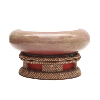 Lot 28 - A partial Chinese Imperial peachbloom-glazed brush washer, Qing dynasty, Kangxi mark and period