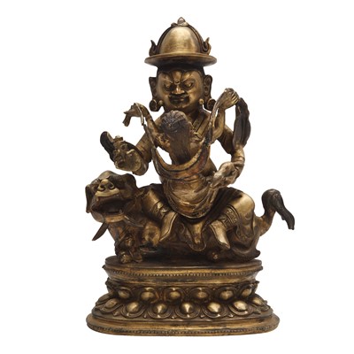 Lot 504 - A Tibetan bronze figure of Jambhala with consort, 20th century