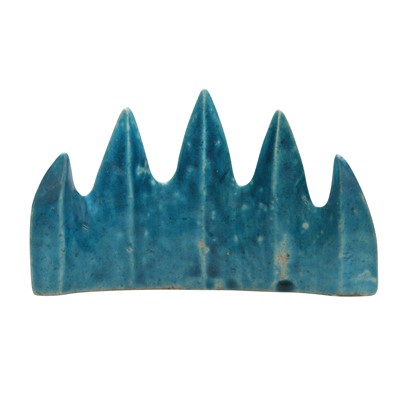 Lot 33 - A Chinese monochrome turquoise-glazed 'mountain' brush rest, Qing dynasty, Kangxi period