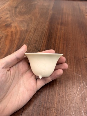 Lot 90 - Two Chinese Dehua inscribed cups, Qing dynasty, 17th/18th century