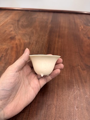 Lot 90 - Two Chinese Dehua inscribed cups, Qing dynasty, 17th/18th century