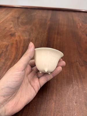 Lot 90 - Two Chinese Dehua inscribed cups, Qing dynasty, 17th/18th century