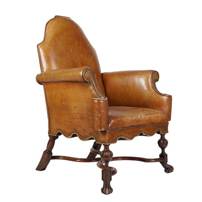 Lot 14 - A William and Mary style tan leather upholstered armchair