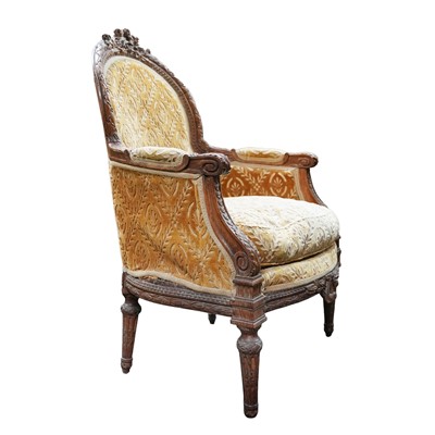 Lot 48 - A Neapolitan carved walnut armchair