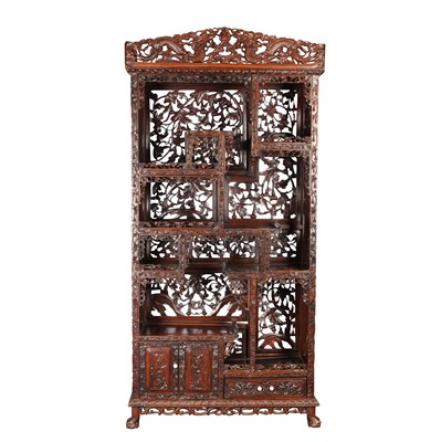 Lot 235 - A Chinese export hardwood carved cabinet, Qing dynasty, 19th century