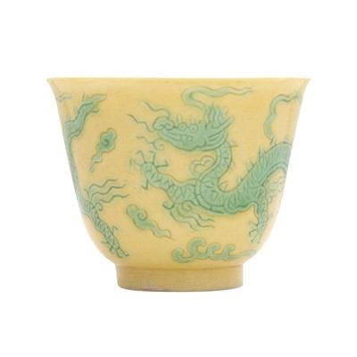 Lot 624 - A Chinese green-decorated yellow-ground 'dragons' wine cup, Qing dynasty, 19th century