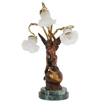 Lot 308 - A gilt and patinated bronze figural table lamp