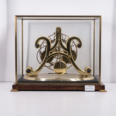 Lot 43 - An epicyclic brass skeleton clock by Dent, London, dated 1973